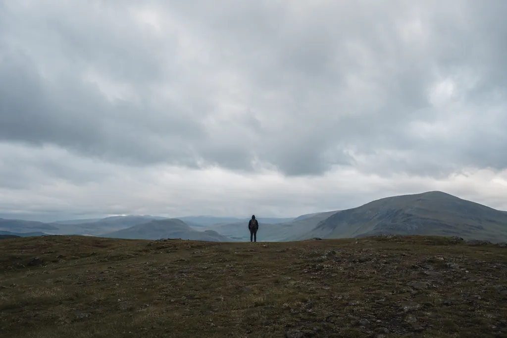 A small figure in a wide open space
